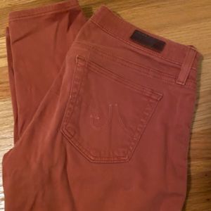 AG legging style sateens. Burnt orange color, size 27.